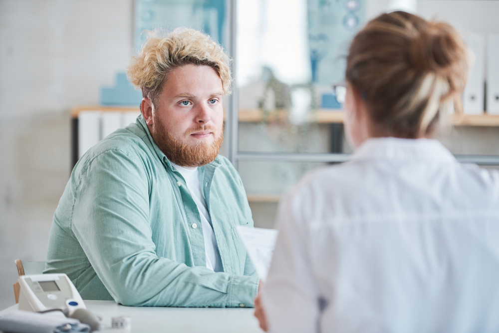 patient discussing weight loss surgery with doctor